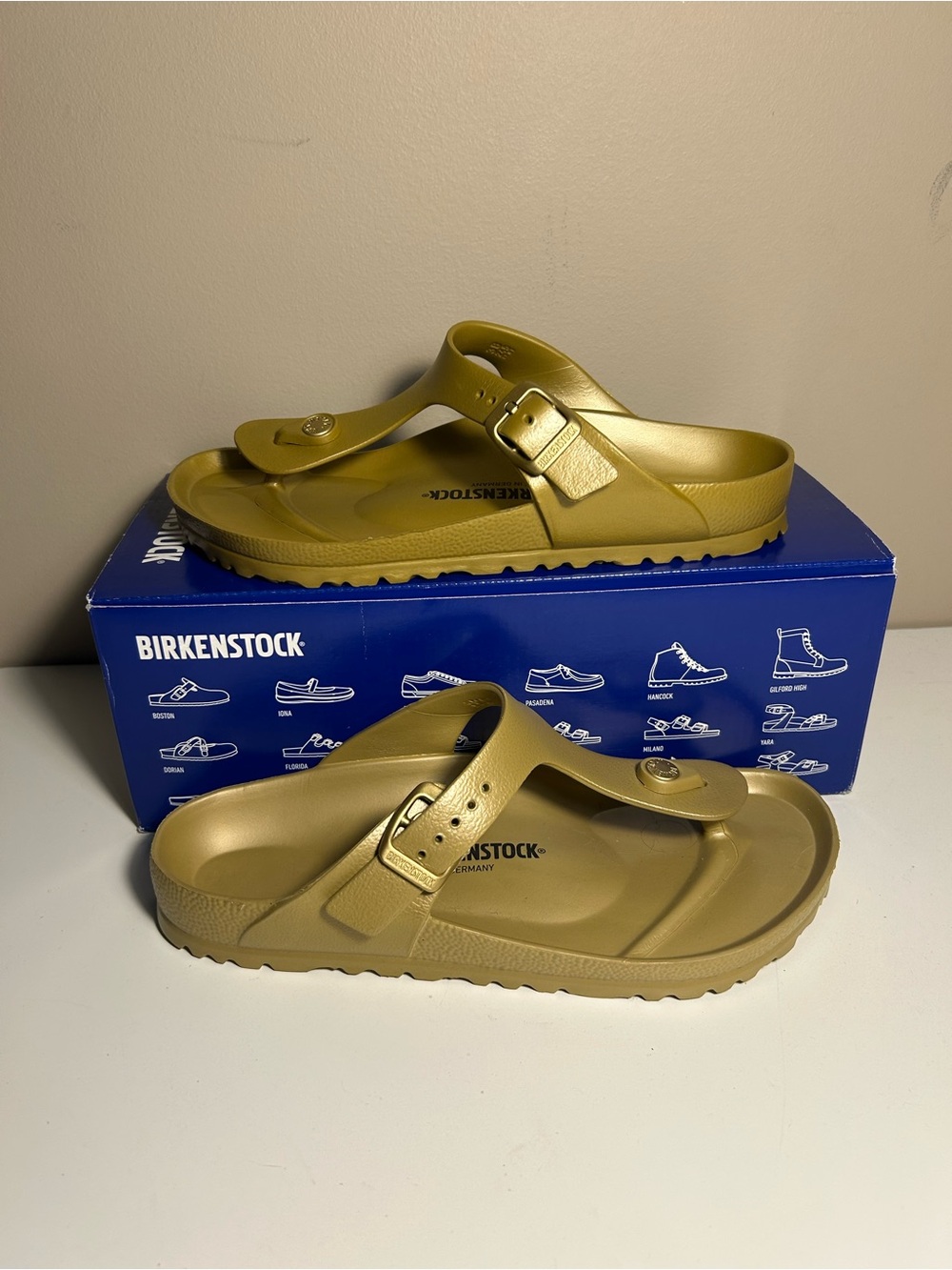 Birkenstock- Gizeh, gold Eva, 7 women sw